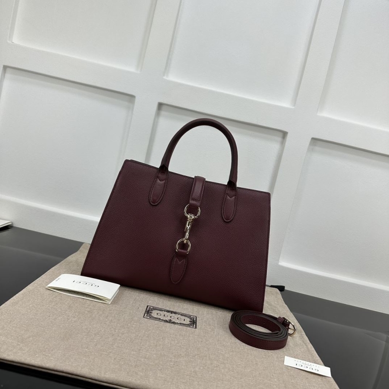 G*u*i shopping bags